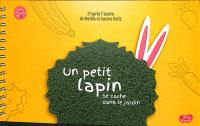 Un petit lapin se cache dans le jardin