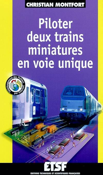 Piloter deux trains miniatures en voie unique