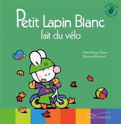 Petit Lapin blanc fait du vélo