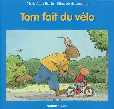 Tom fait du vélo