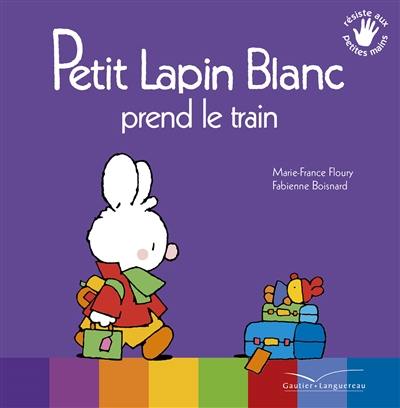 Petit Lapin blanc prend le train