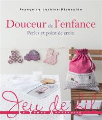 Douceur de l'enfance : perles et point de croix